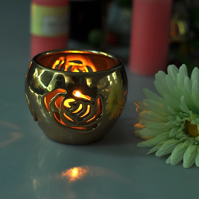 Pierced flower ceramic candle holders