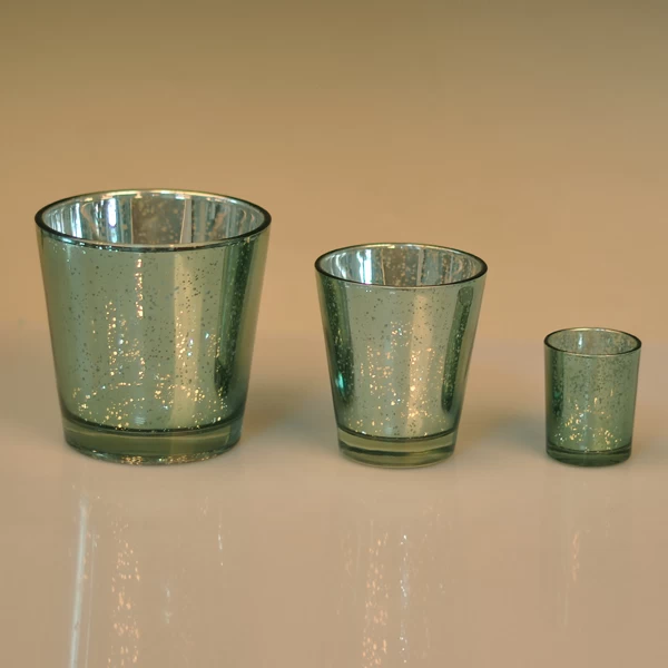 Three different size mercury glass candle holders for home decoration