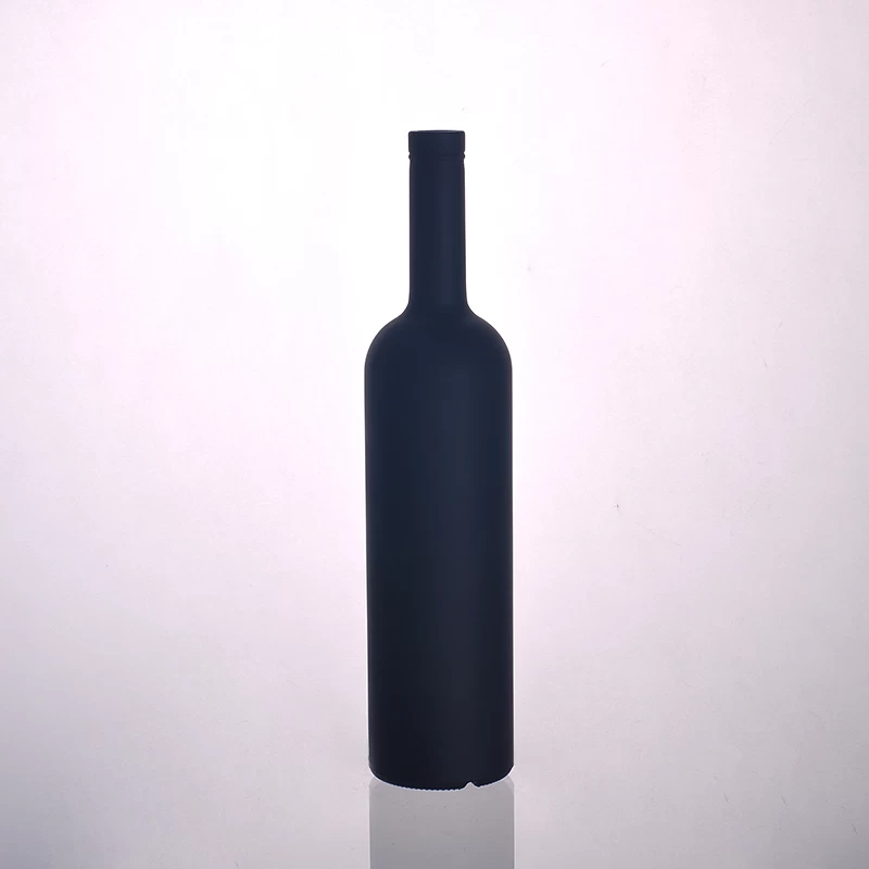 glass wine bottle with blue spray color