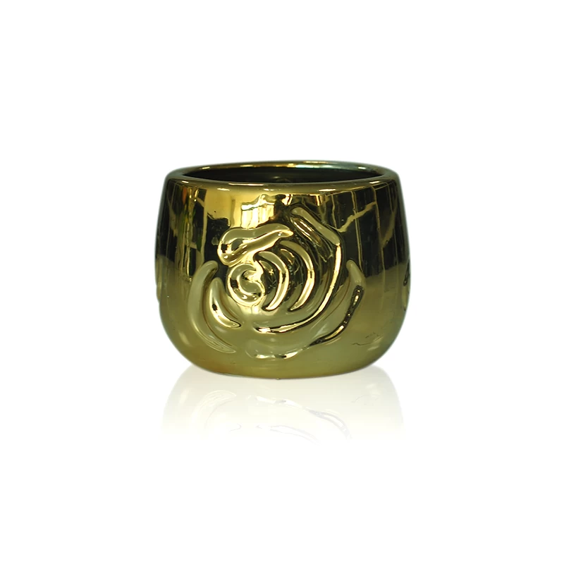 Ceramic candle holder with gold plating