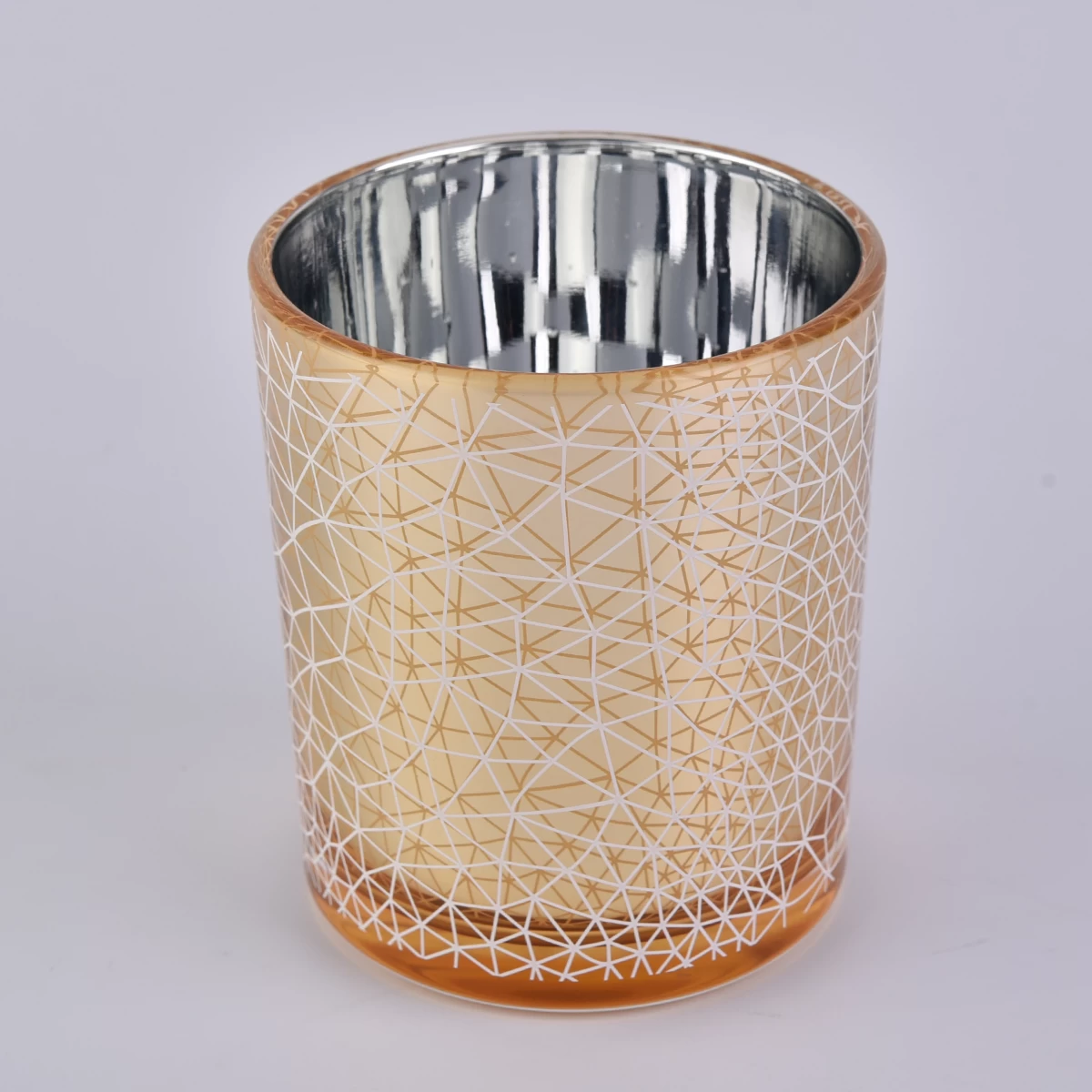 gold electroplated glass candle vessel with unique imprint