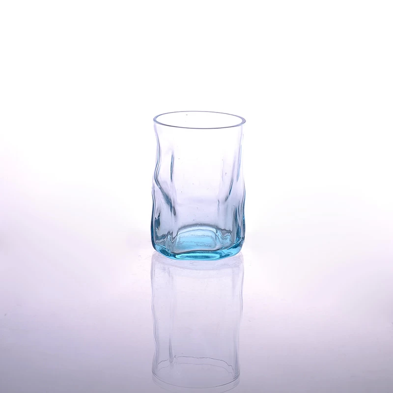 light blue glass candle cup