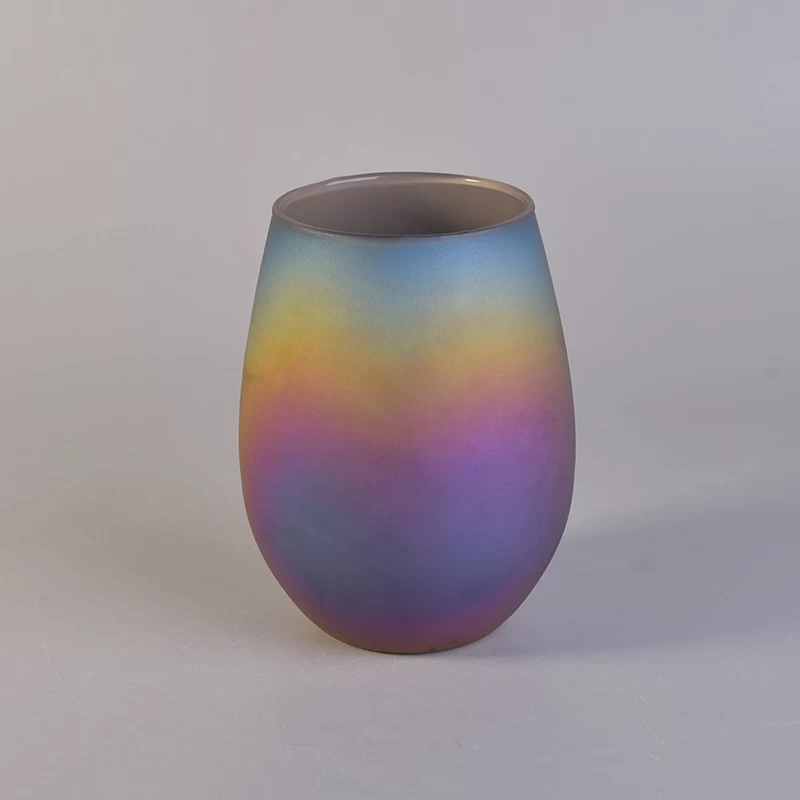 Oval iridescent glass candle vessel