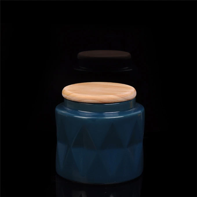 Ceramic candle holder with wood lids