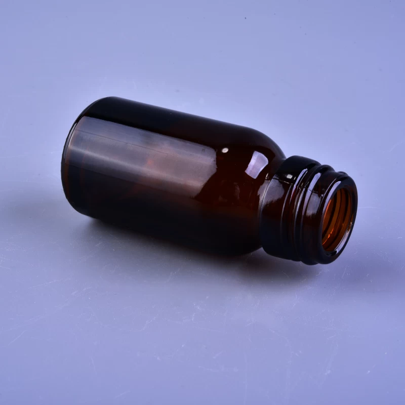 Small screw top amber glass bottle for medicine 