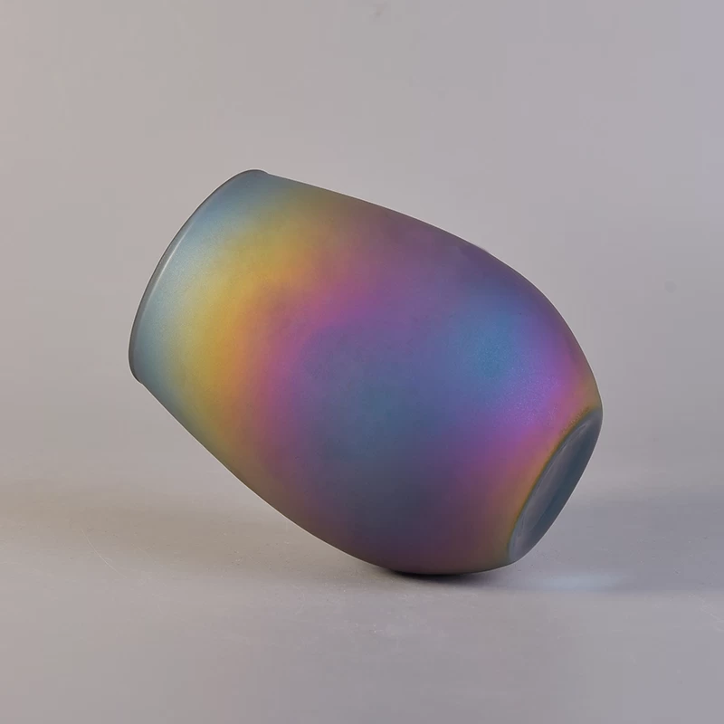 Oval iridescent glass candle vessel
