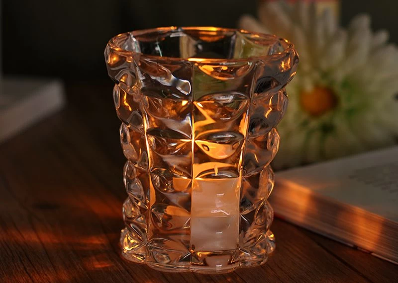 Item name:Home Decor Votive Glass Candle Holder  Item No:SGHY15032609 Top dia:80mm                               Bottom dia:70mm                                     Height:94mm                                           Weight:310g Capacity:215mL Material: Hight white glass Craft: Machine pressed  Sampling time: 5 ~ 7 days after confirmation Production Capacity:500,000 ~ 1,000,000 pieces/month  Packing: 48 pieces/box MOQ:5,000pcs