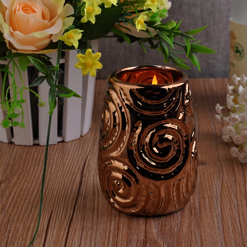 Golden embossed flower ceramic candle holders