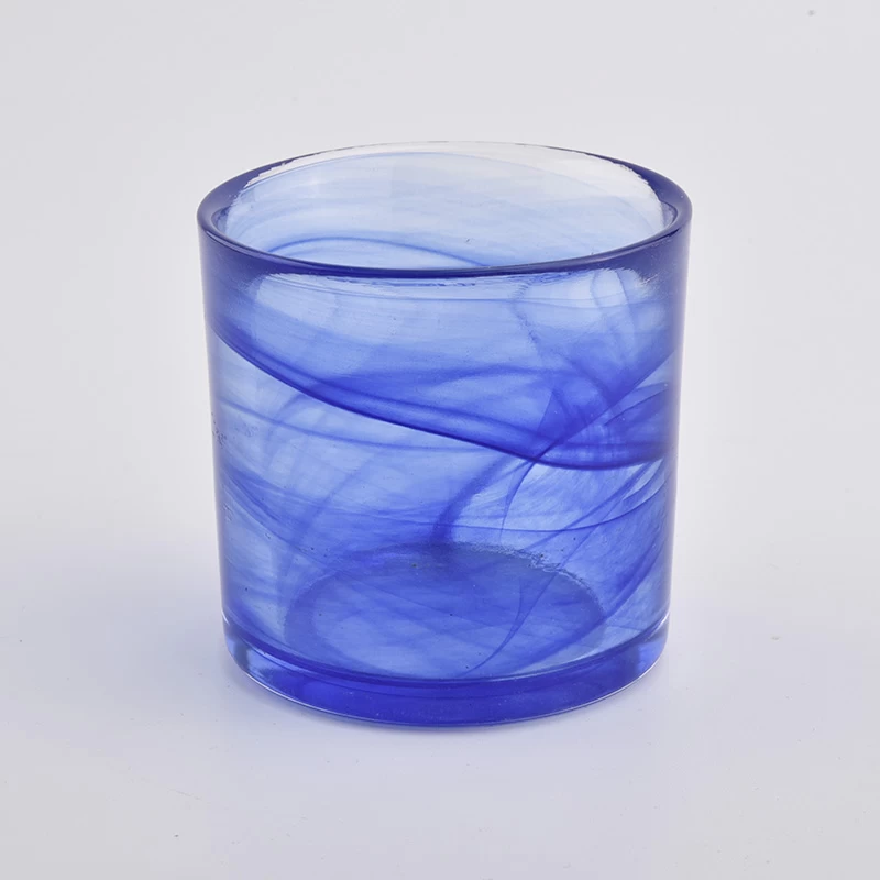 blue colored glass cansle vessel with ground edge top