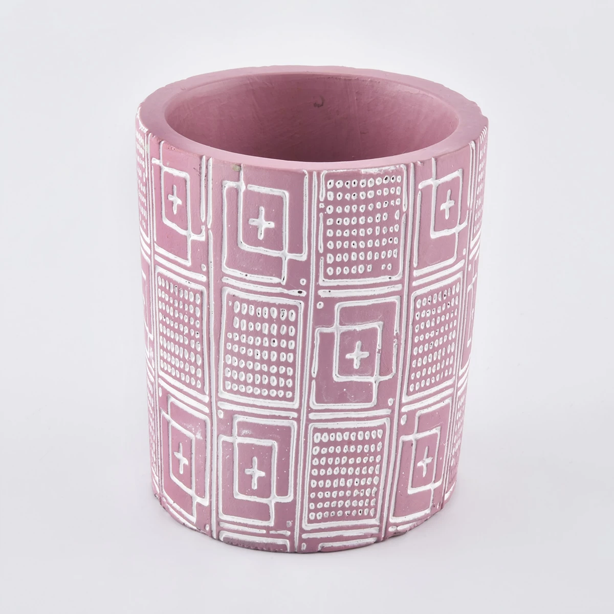 pink candle jar with white dcement ebossed pattern