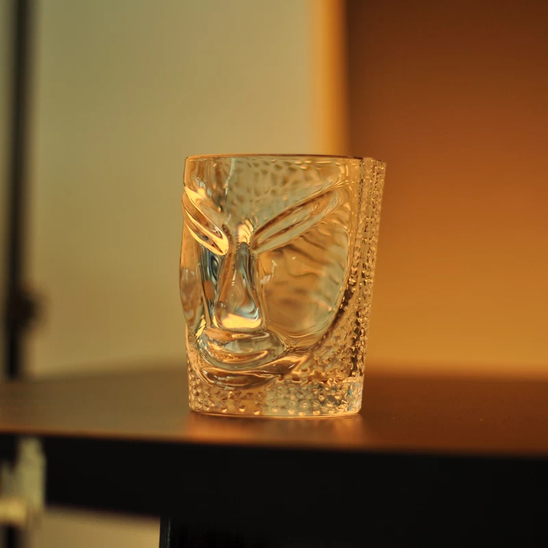 Face design embossed glass candle holder wholesale