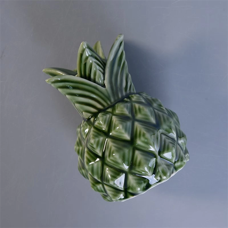 Green pineapple shaped ceramic diffuser bottles with reed