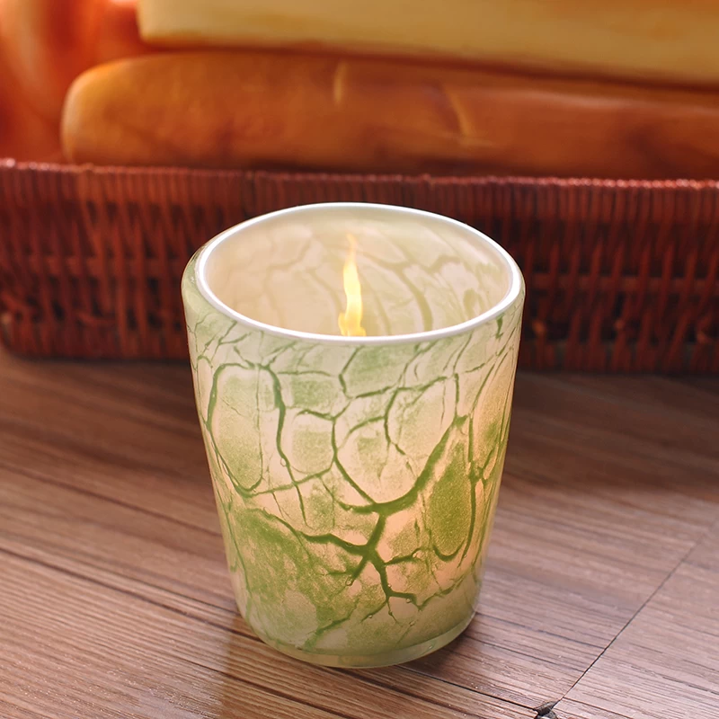 Green glass candle jar