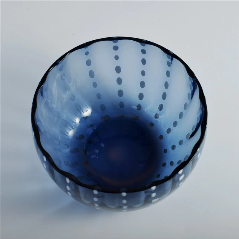 Blue solid glass candle container