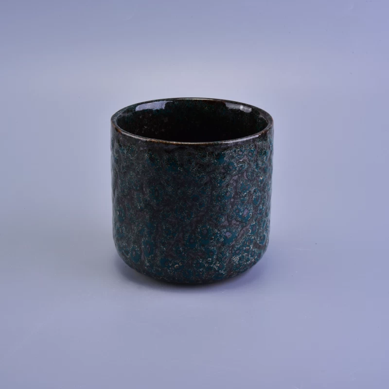 Rough shinny surface unique dark green glazed ceramic candle jar 