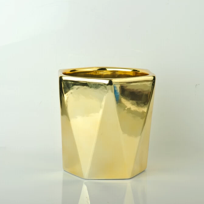gold color ceramic candle jar