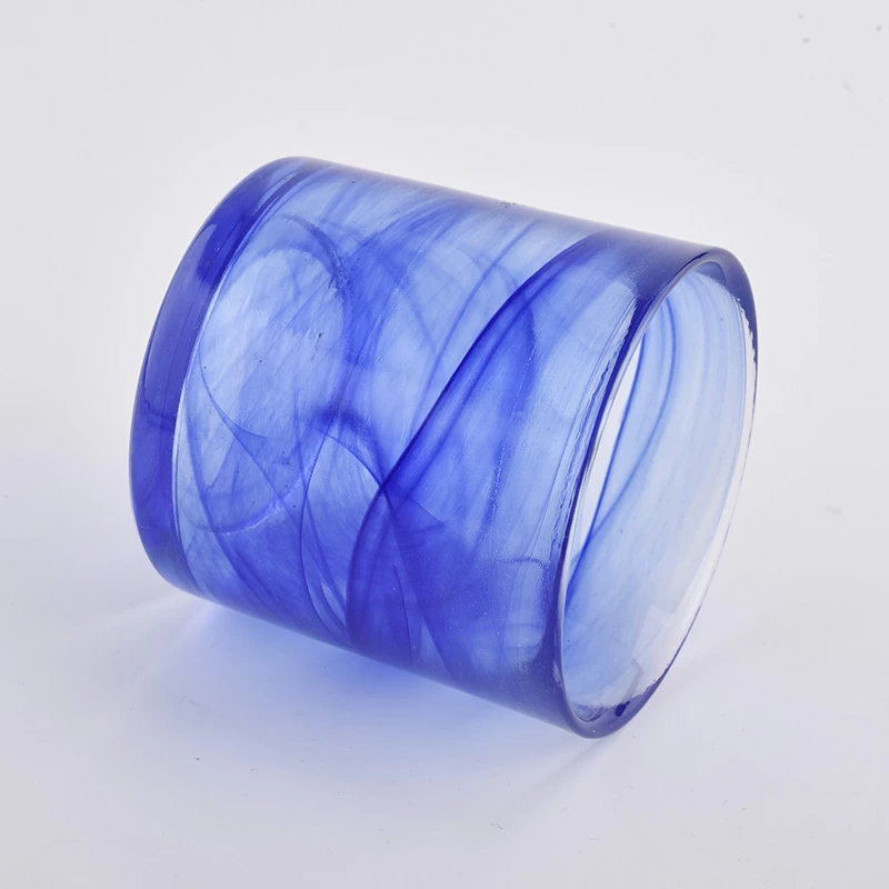blue colored glass cansle vessel with ground edge top