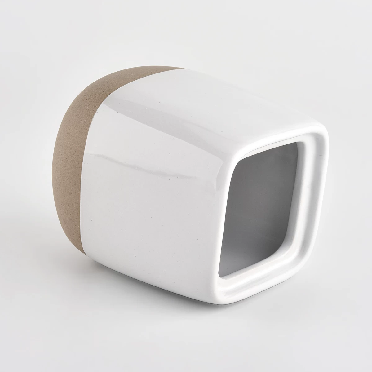 glossy white ceramic vessel with square lid
