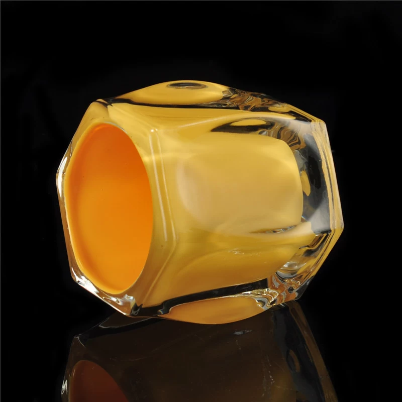 Yellowish clear round votive glass candle holder 