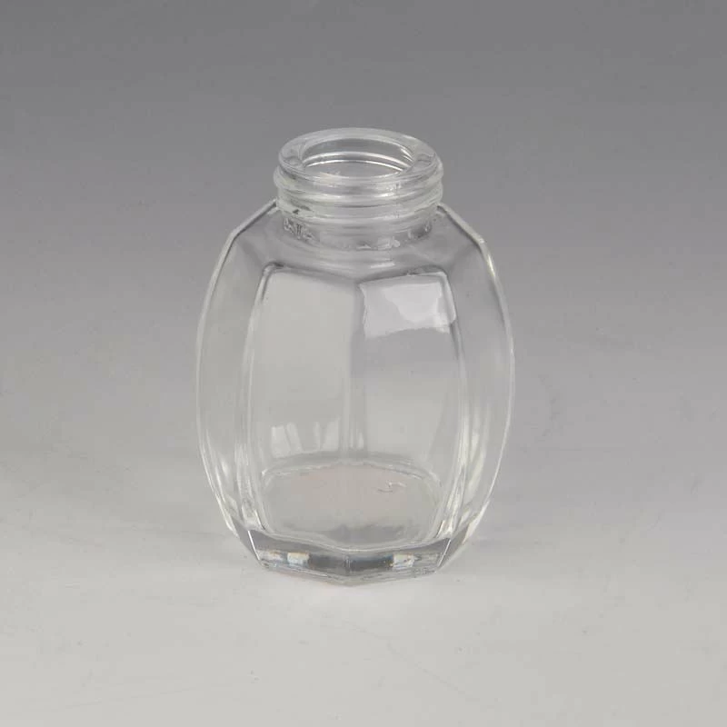 football shape glass essential oil bottle
