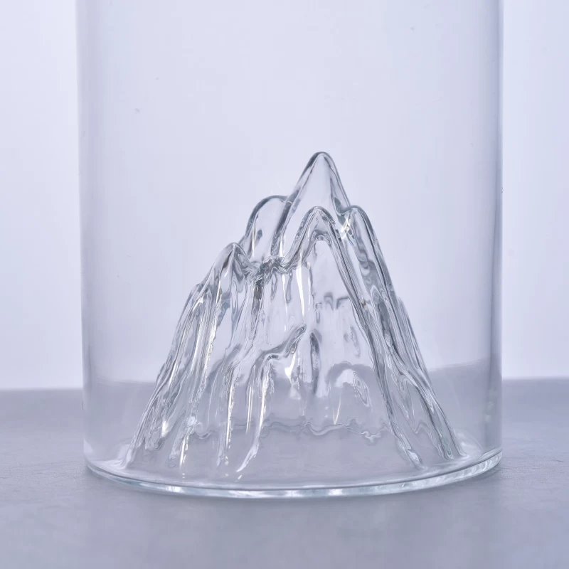 Unique large glass bottle with mountain design bottom 