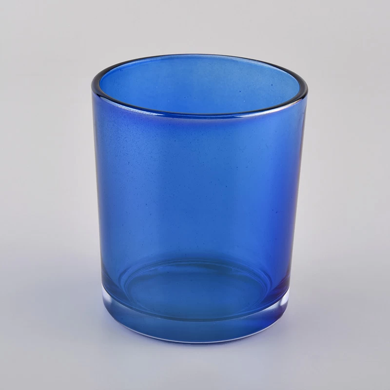 Shiny transparent glass candle vessels 