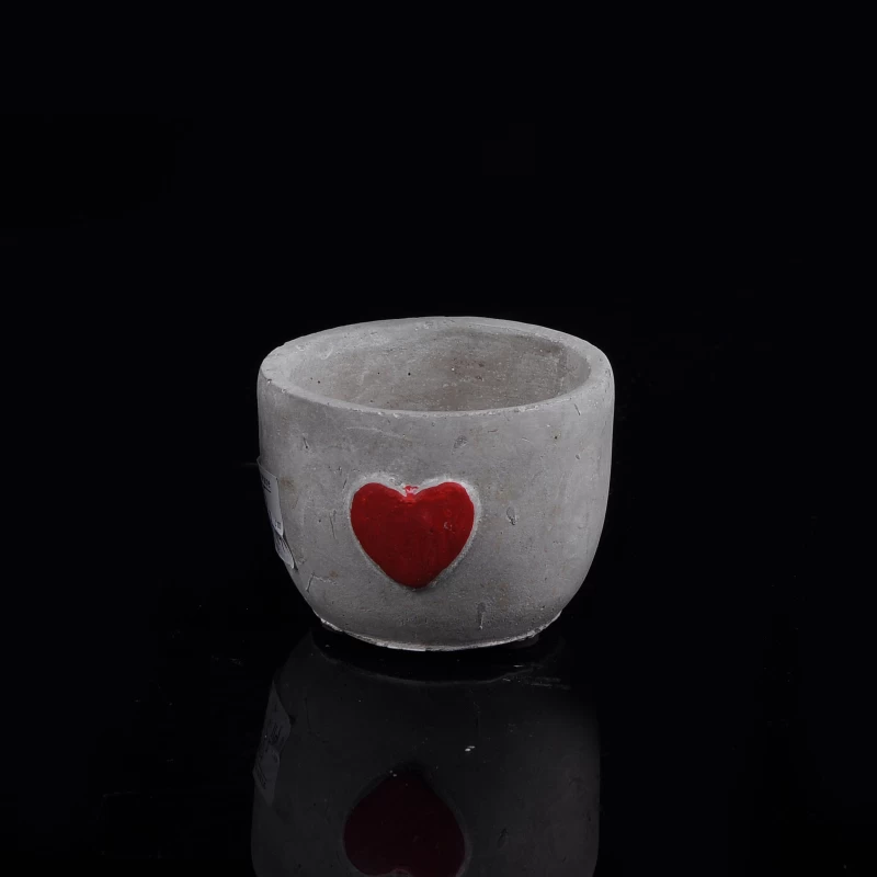 Round shape concrete candle container with heart emboss