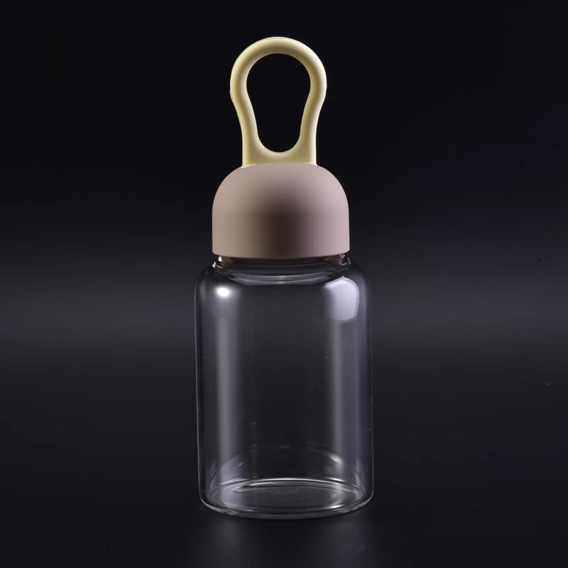 Glass water bottle with rubber lid