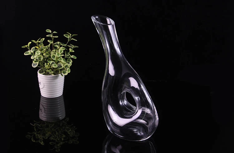 Glass decanter with hole
