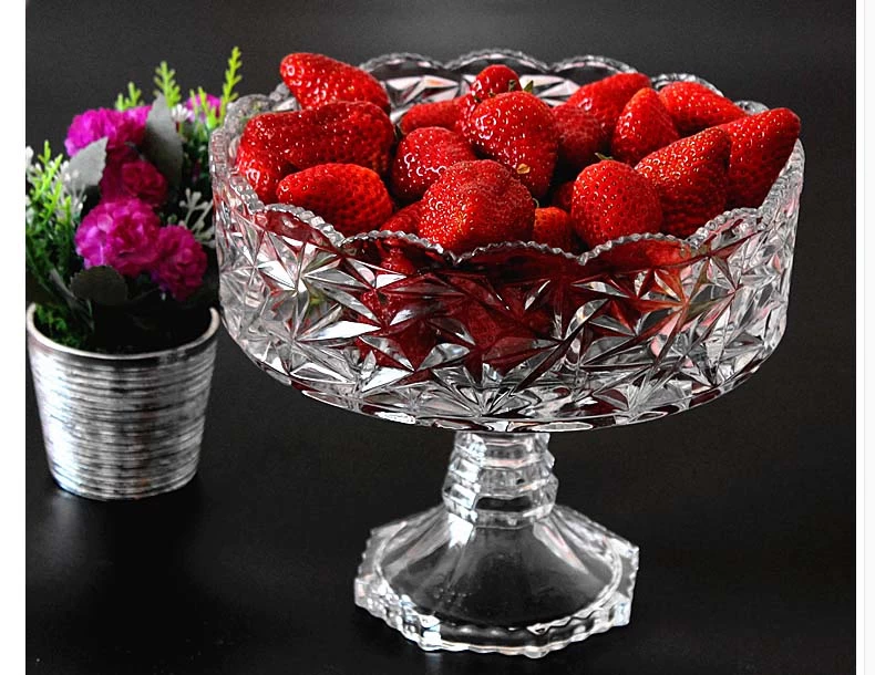 Tall glass fruit bowl