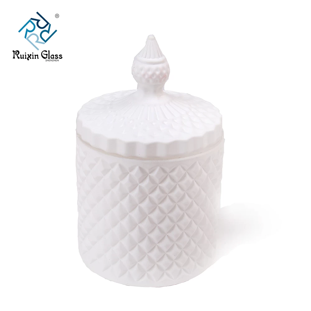 white glass candle jars