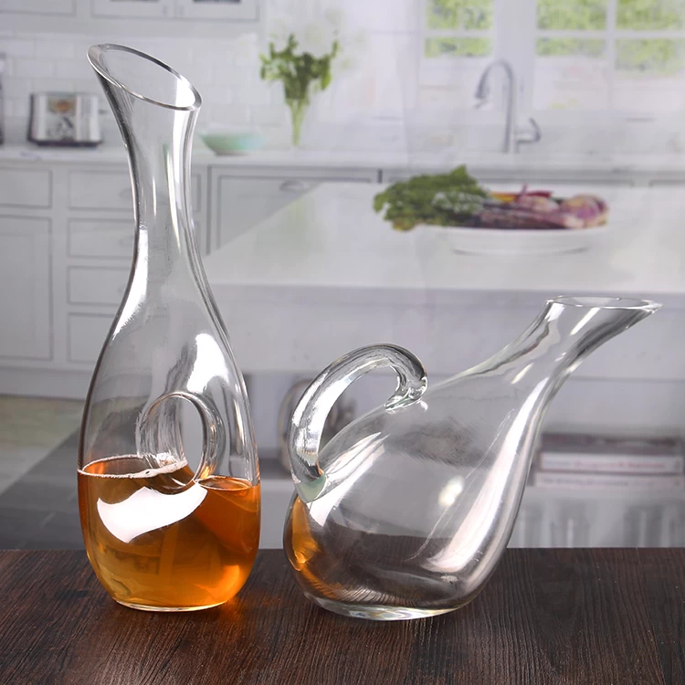 Clear glass decanter with handle