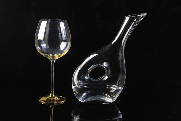 Glass decanter with hole