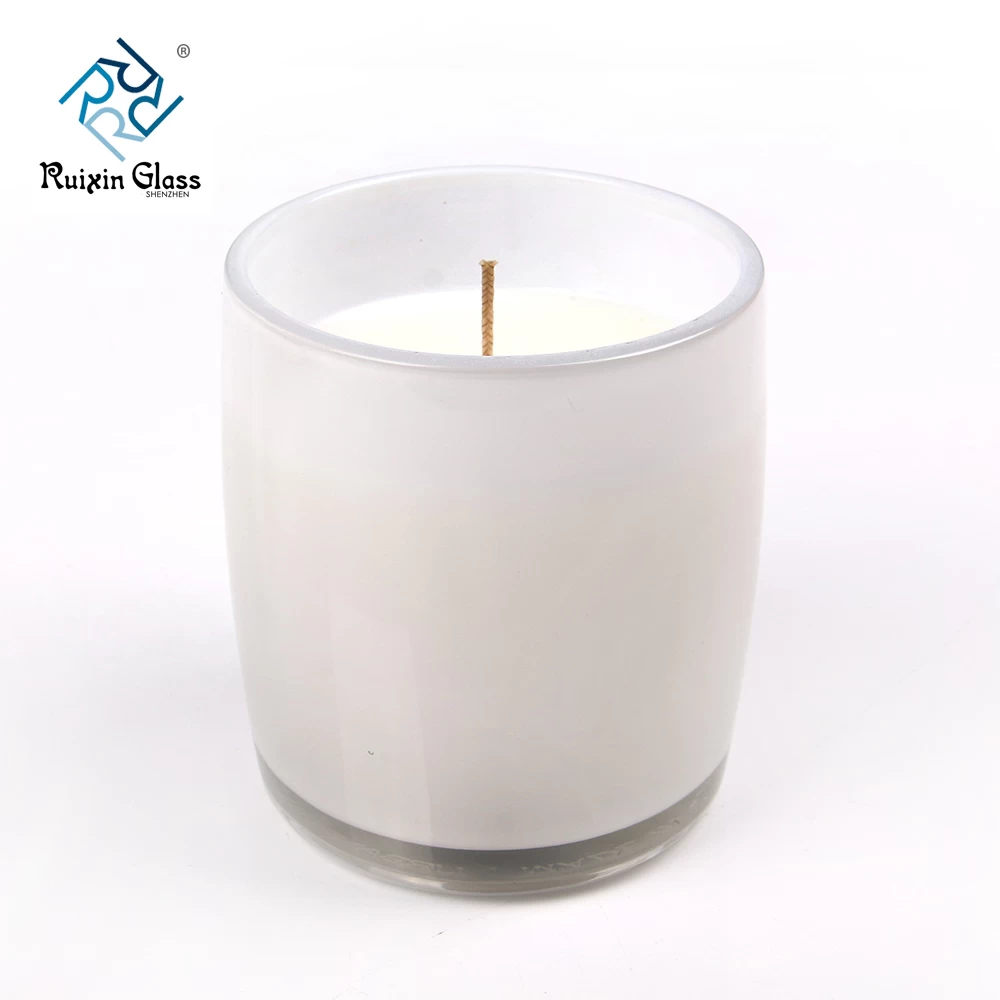 white glass candle jars