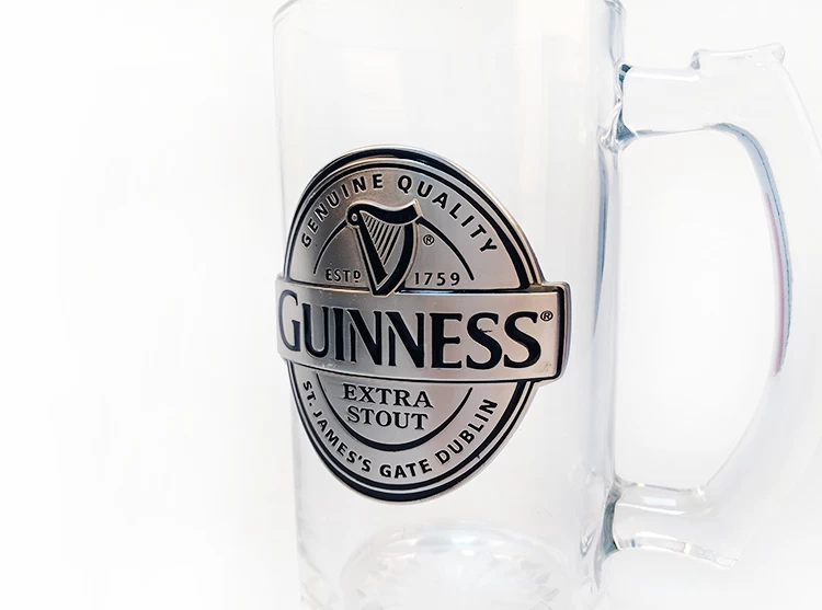 OEM customized beer glass with metal badge