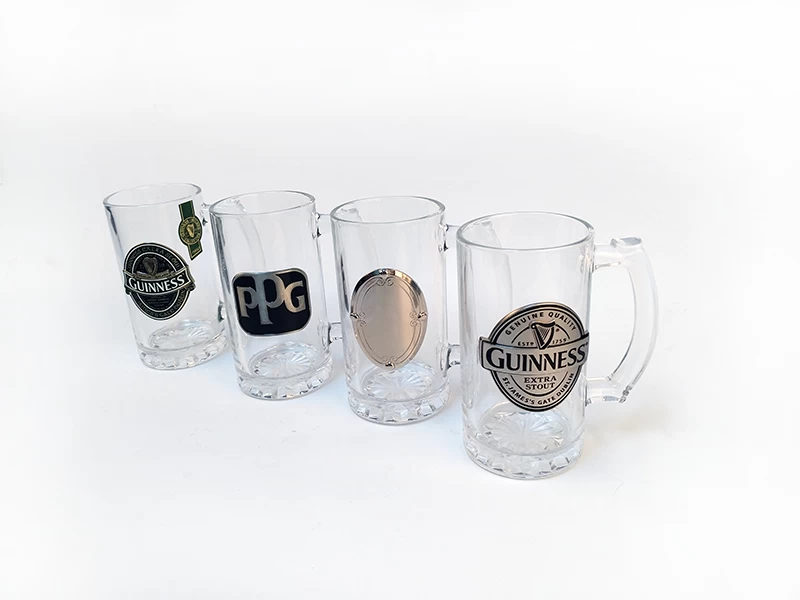 beer glass with metal logo