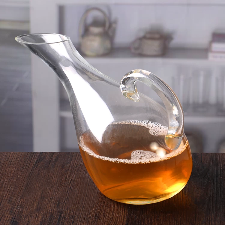 Clear glass decanter with handle