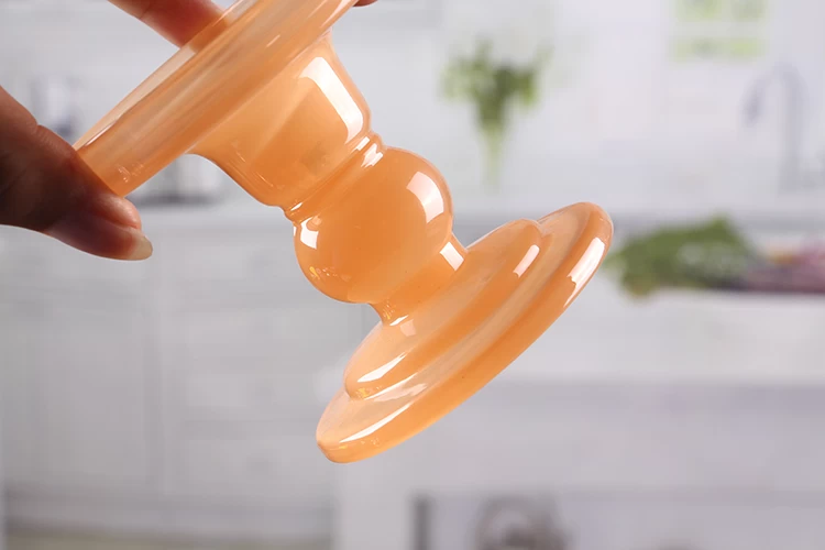 Orange glass candle holder