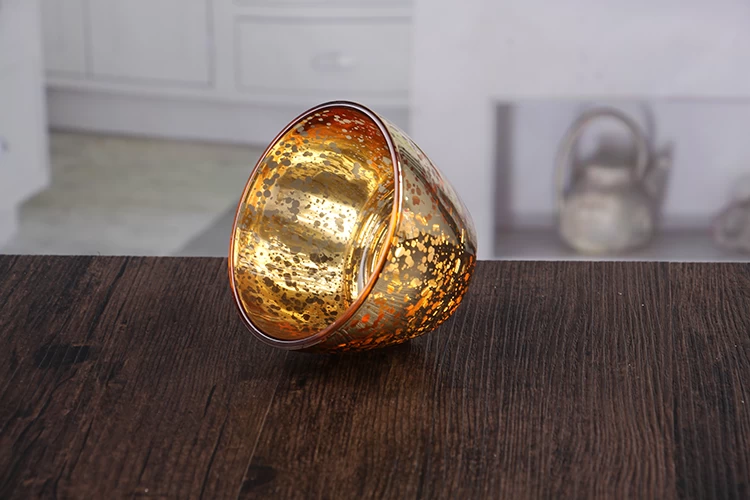 Glass bowl shaped candle holder