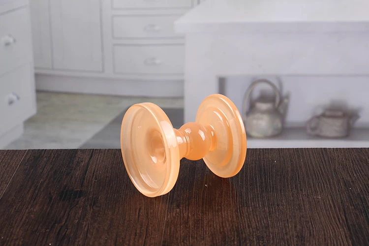 Orange glass candle holder