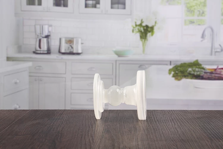 White pillar candle holders
