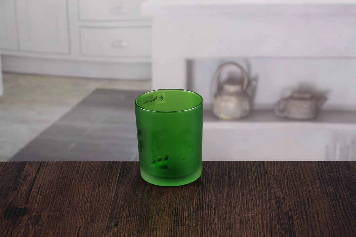 Small green candle holders