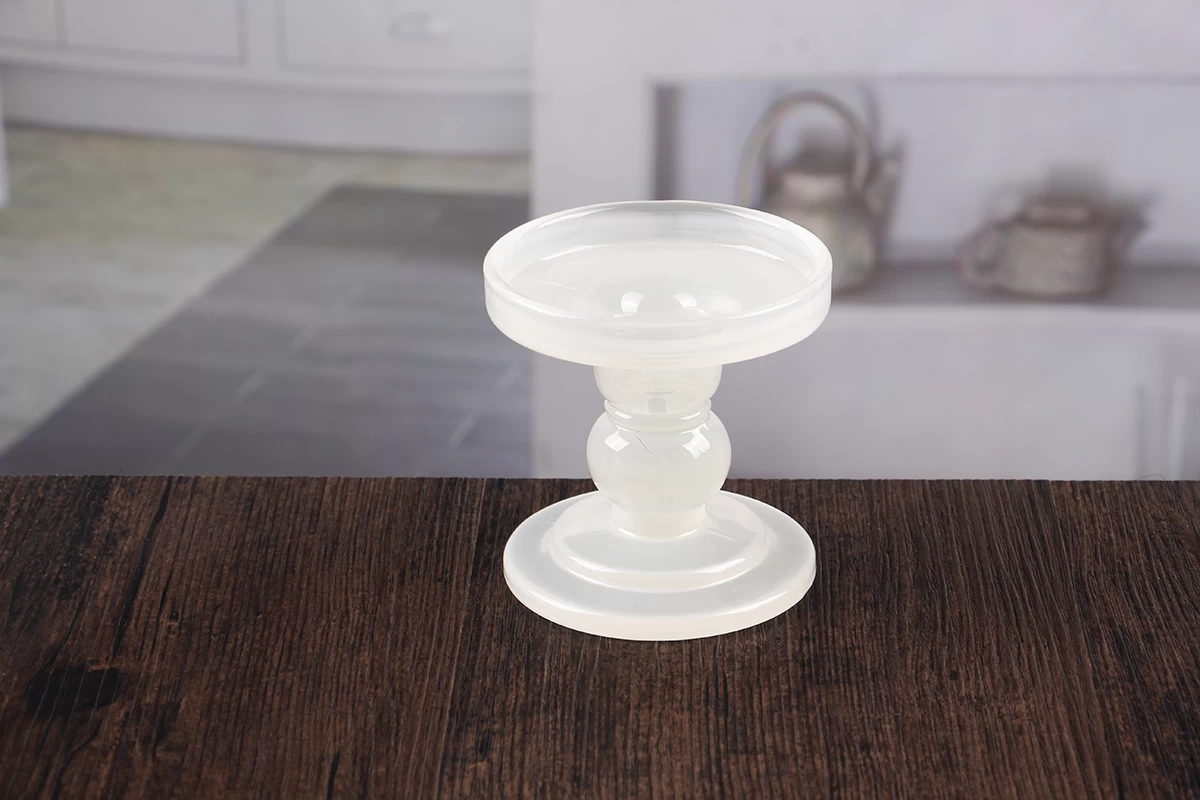White pillar candle holders
