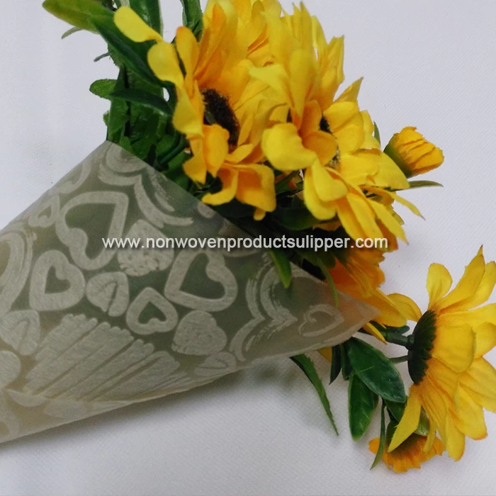 Light Yellow Heart-shaped Embossing GT-HSLIYE01 PP Spunbond Non Woven Custom Wrapping Paper On Sales