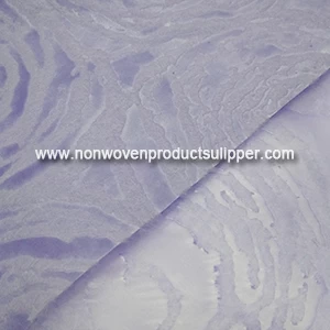 China China Manufacturer Purple Rose Embossing GT-HSROPU01 PP Spunbond Non Woven Gift Wrapping Paper Roll manufacturer