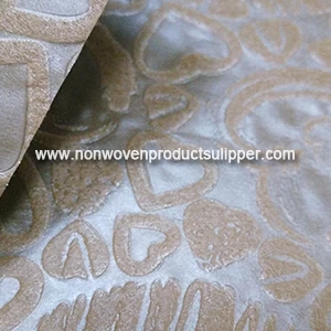 China China Supplier Brown Heart-shaped Embossing GT-HSBR01 PP Spunbond Non Woven For Floral Bags manufacturer