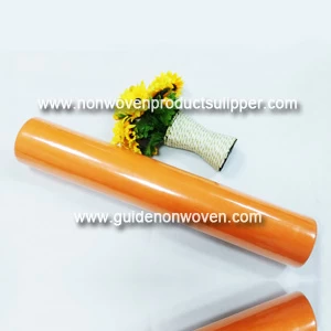 China GTTN-or Orange Color 60cm Width Independent Packaging Non Woven Fabric For Wedding Gift Wrap manufacturer