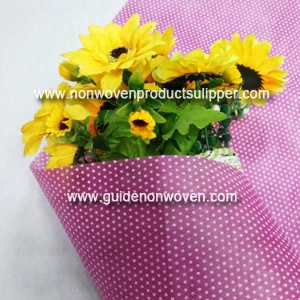 China GTTNp-wr White Small Round Dot Printing Non Woven Fabric For Christmas Gift Wrapping Paper manufacturer
