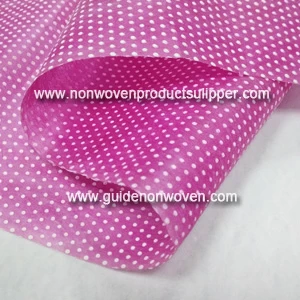 China GTTNp-wr White Small Round Dot Printing Non Woven Fabric For Christmas Gift Wrapping Paper manufacturer