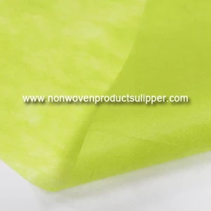China GTYLTC-LG China Factory Embossed Pattern Polyester Spunbond Non Woven Fabric For Tablecloth And Decoration manufacturer